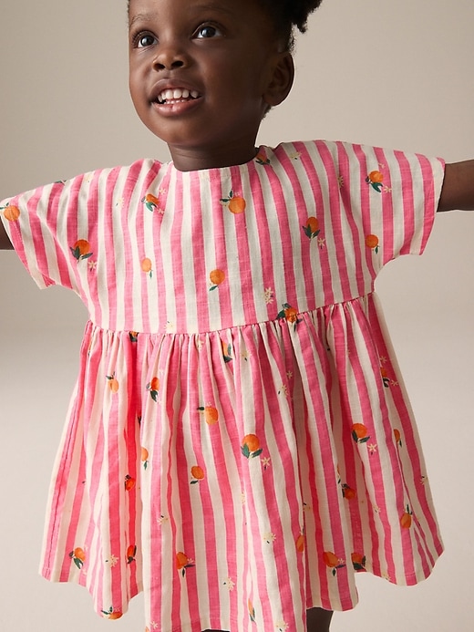 Image number 1 showing, NEXT Toddler Orange & Stripe Dress