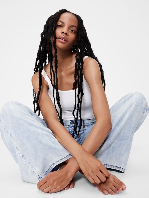 5 of 8 showing, with the color Light indigo of product GapStudio Mid Rise Draped Denim Baggy Jeans