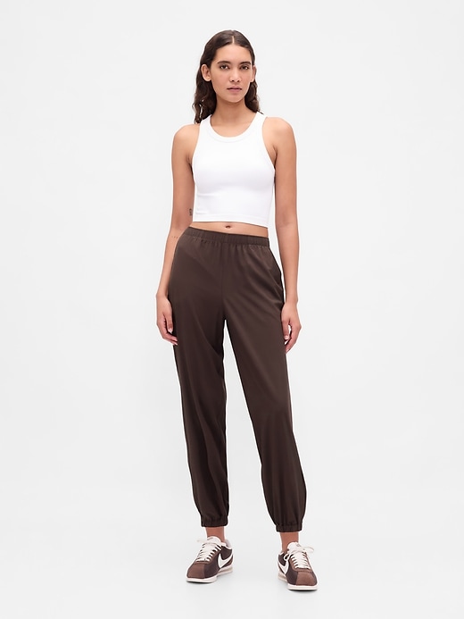 Image number 1 showing, GapFit Tech High Rise Zip-Hem Joggers