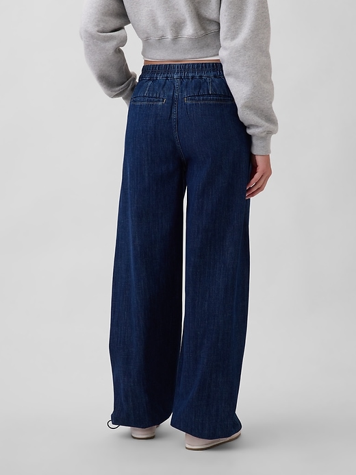 Image number 4 showing, High Rise Cinch-Hem Horseshoe Jeans